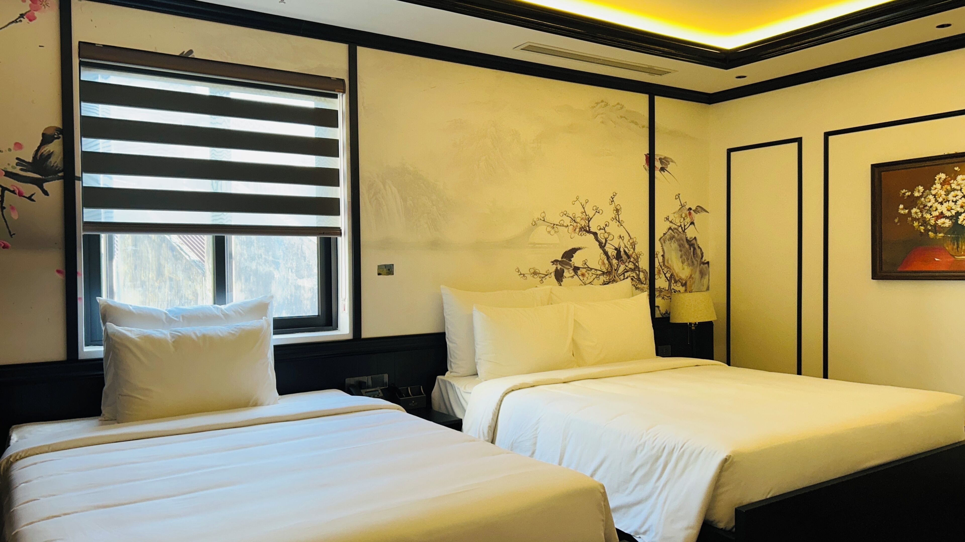 Kamar Triple Deluks, pemandangan kebun | Meja kerja, ruang kerja ramah laptop, dan Wi-Fi gratis