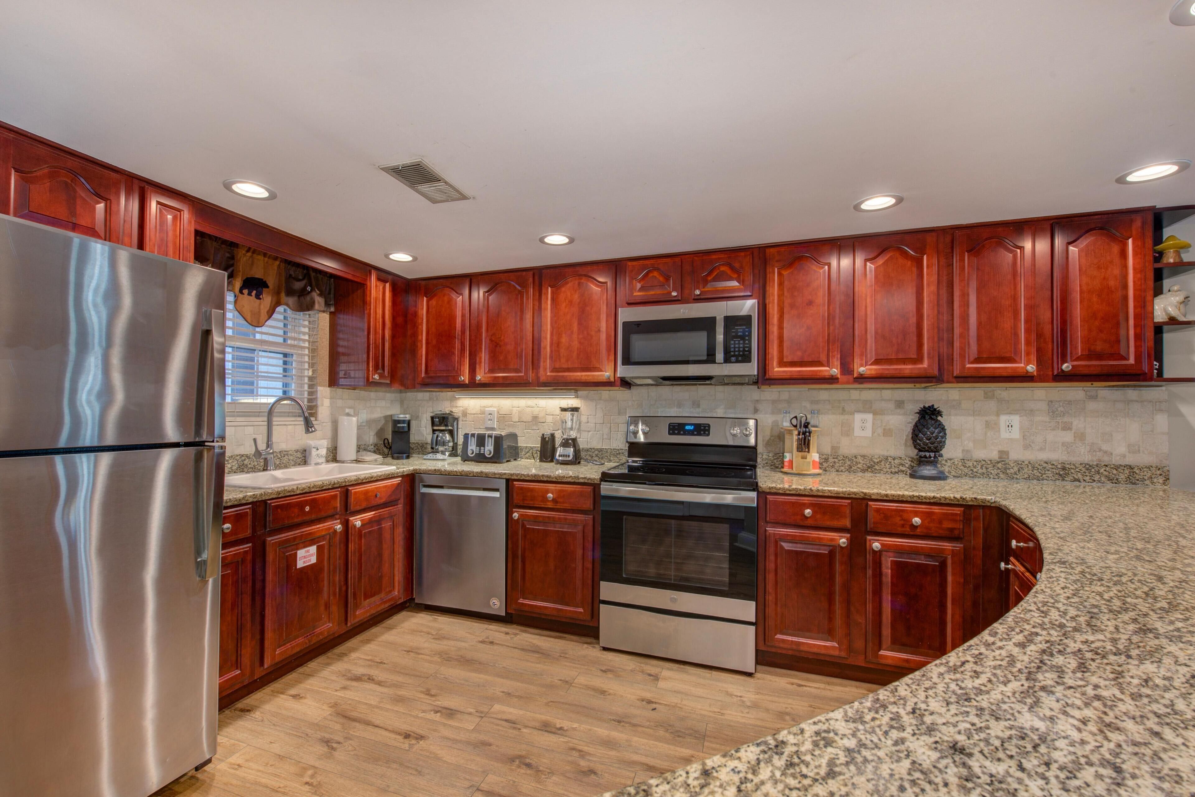 Condo, Multiple Beds (Riverside Escape) | Private kitchen