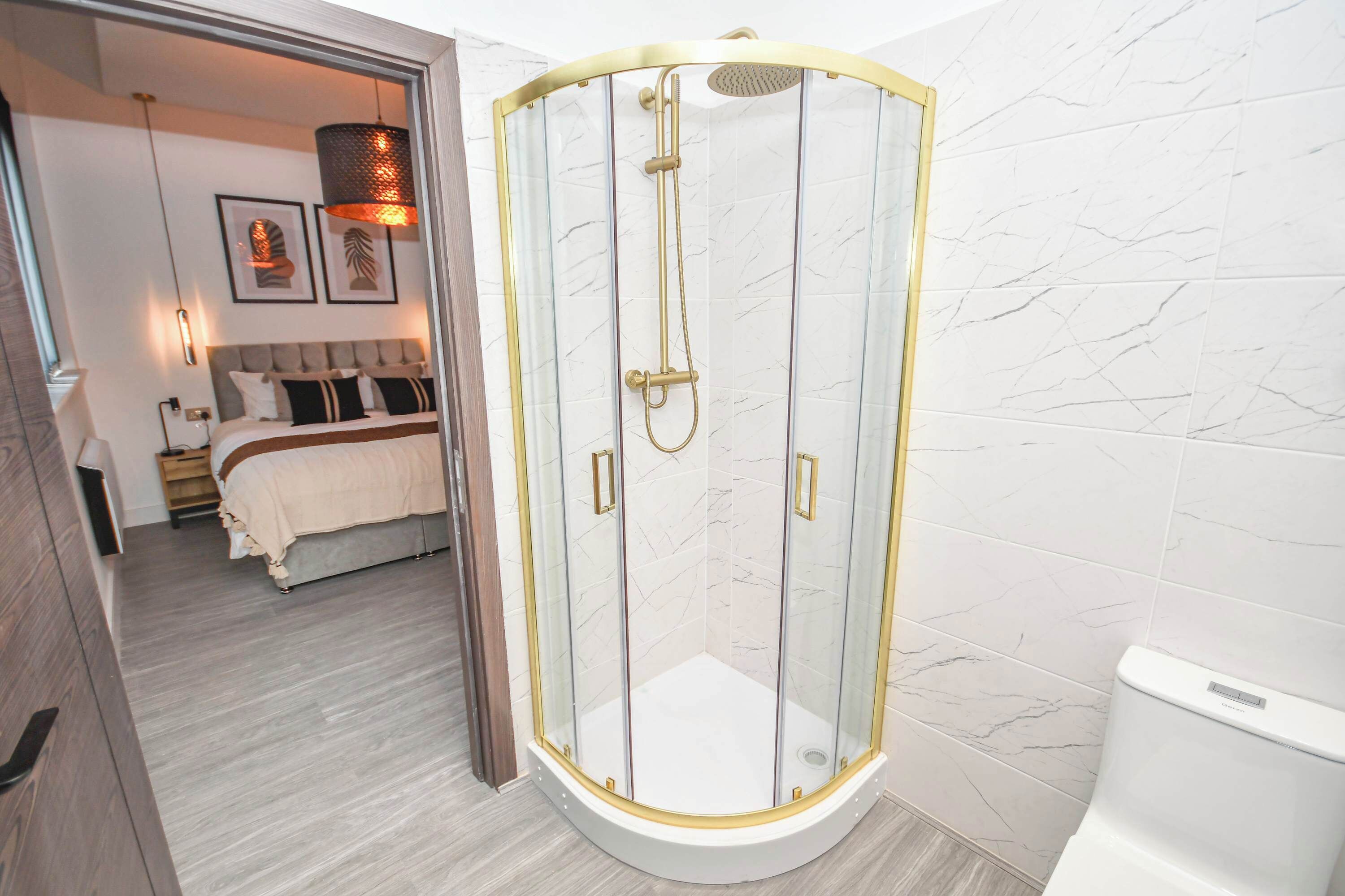 Shower, hair dryer, towels, shampoo