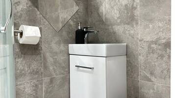 Hair dryer, towels, soap, toilet paper