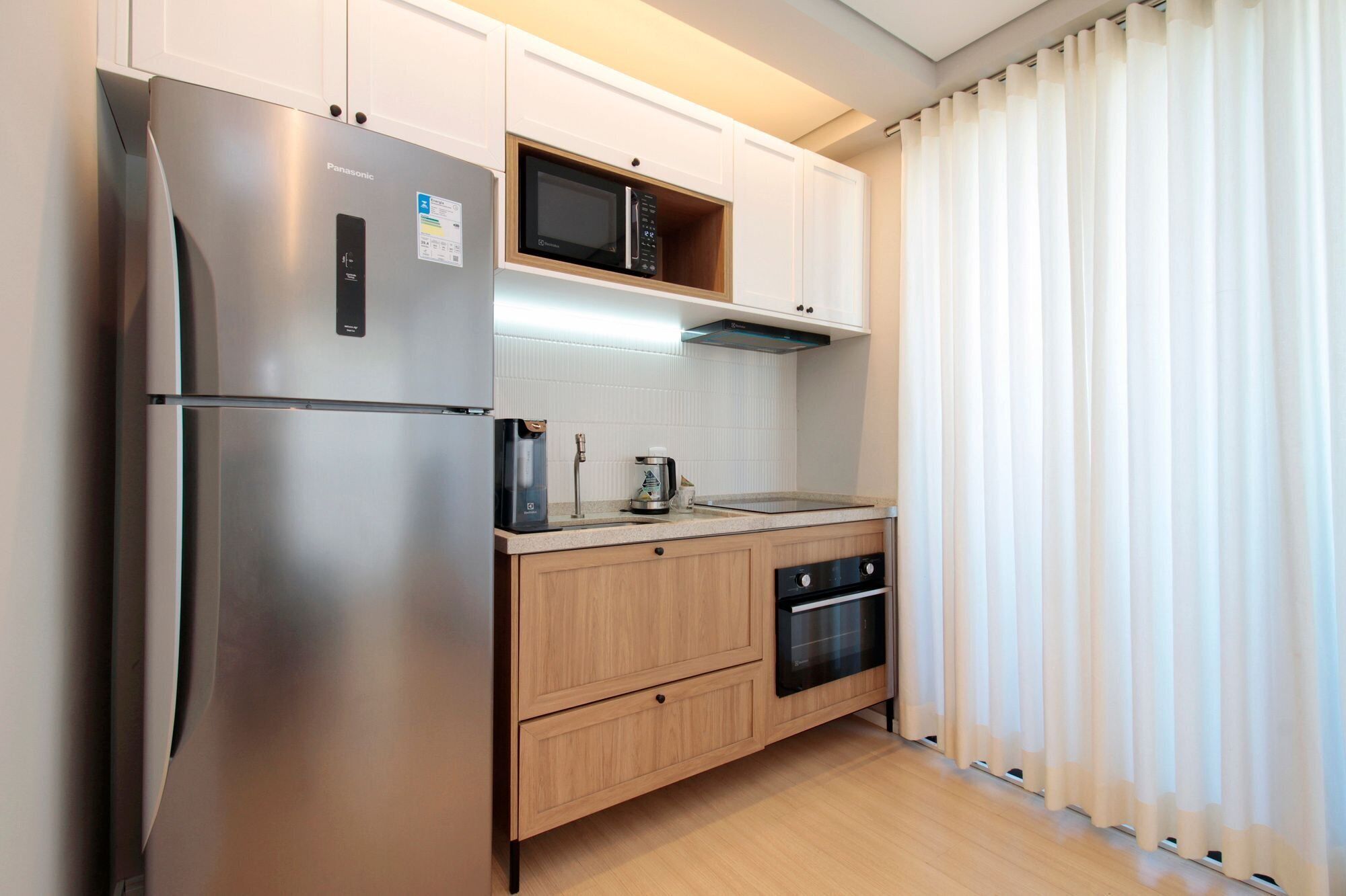 Apartamento | Cozinha privada | Geladeira grande, micro-ondas, cooktop