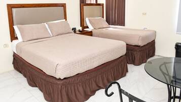 Studio 3 with one queen bed and one single bed