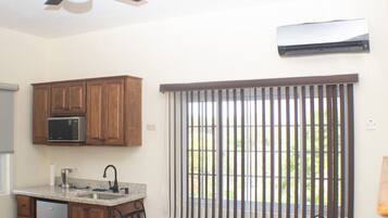 Fridge, microwave, stovetop, coffee/tea maker