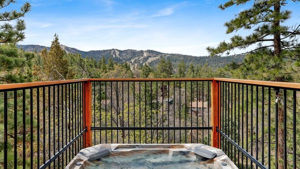 A hot tub with a view of mountains and trees. - Aspen Bear Retreat#2610 (Big Bear City)