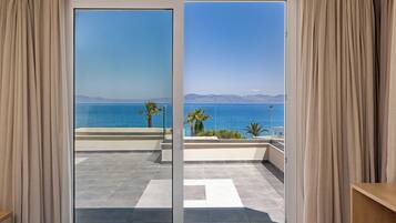 Suite, para no fumadores, vista al océano | Cunas gratuitas, wifi gratis y ropa de cama