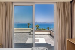 Suite, para no fumadores, vista al océano | Cunas gratuitas, wifi gratis y ropa de cama 