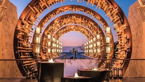 A circular architectural structure with multiple levels of seating and lighting, overlooking a body of water. - Thanksgiving in beautiful San José del Cabo at Grand Mayan one bedroom (San José del Cabo)