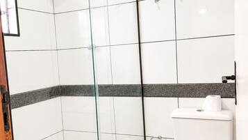 Standard Double Room | Bathroom | Shower, towels, soap, shampoo