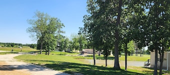 BEAUTIFUL LAKE SHELBYVILLE CAMPING SITE ALONG SIDE STOCKED FISHING PONDS SITE#1