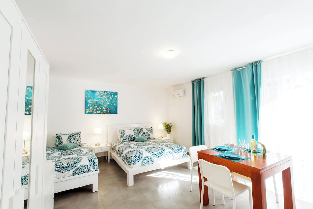 Studio, Poolside | In-room safe, blackout drapes, iron/ironing board, free WiFi