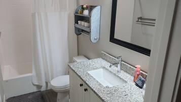 Hair dryer, towels, soap, toilet paper