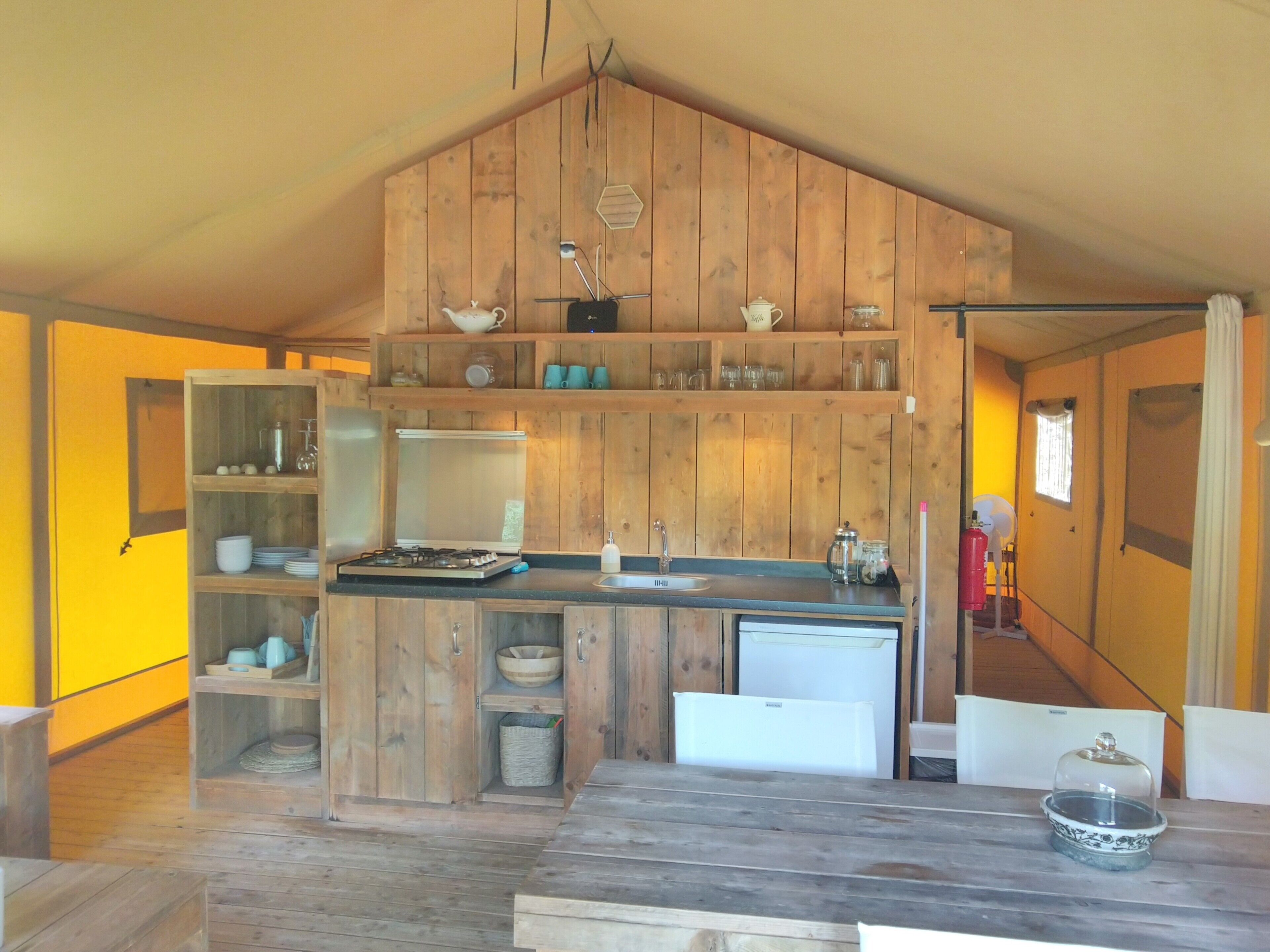 Fridge, stovetop, coffee/tea maker, electric kettle