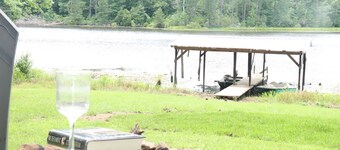 Charming 2-bedroom cabin with AC in peaceful Garrison on private 25 acre lake
