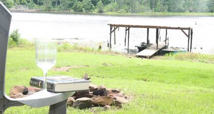 Charming 2-bedroom cabin with AC in peaceful Garrison on private 25 acre lake