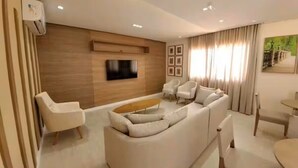 Living area - Apartment with ocean view in Smart Pituba. (Salvador)