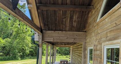 Rustic 6-bedroom cabin with private lake access in a nature camp setting