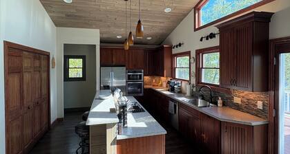 Secluded Lake front Cabin on 2.5 Acres with boat dock - sleeps 10