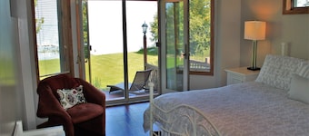 Amazing 6-bedroom, 5K sq. ft, one acre secluded Mullett Lake Beachfront Home