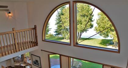 Amazing 6-bedroom, 5K sq. ft, one acre secluded Mullett Lake Beachfront Home