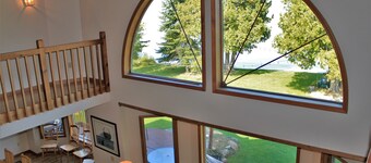Amazing 6-bedroom, 5K sq. ft, one acre secluded Mullett Lake Beachfront Home