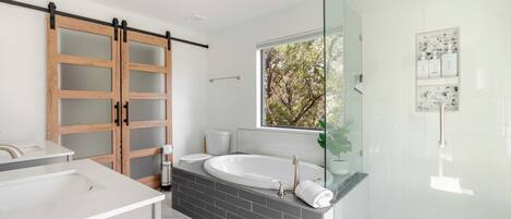 Shower, hair dryer, towels, soap