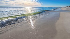 A beach with a clear sky and sunlight reflecting on the water. - Santa Rosa Home with Private Pool, Near Beach (Santa Rosa Beach)