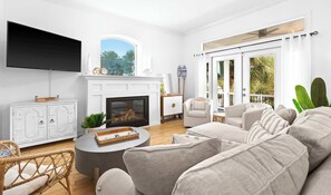 A modern living room with a fireplace, white furniture, a flat-screen TV, and a balcony with large windows. - Santa Rosa Home with Pool, Deck & Beach Access (Santa Rosa Beach)