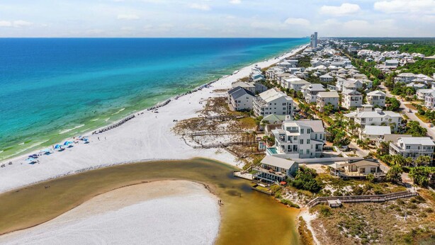 A coastal area with a beach, beachfront properties, and a distant tower. - Seagrove Home for Groups, Near 30A Beach & Pool (Santa Rosa Beach)