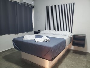 Habitación, 1 cama Queen size | Wifi gratis 