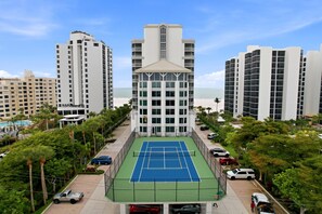 Sports court - Beachfront Bliss, Cozy Condo with Patio, Pool & Stunning Views! (Fort Myers Beach)