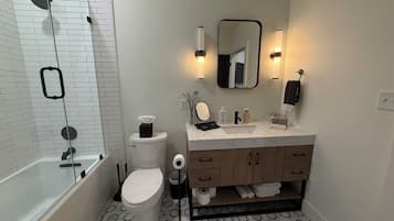 Hair dryer, towels, soap, shampoo