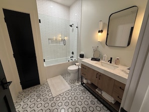 Hair dryer, towels, soap, shampoo