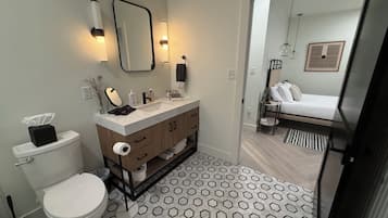 Hair dryer, towels, soap, shampoo