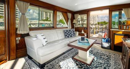 Stay Aboard a Vintage Hatteras 53' Motor Yacht in Aventura-A Unique Experience!