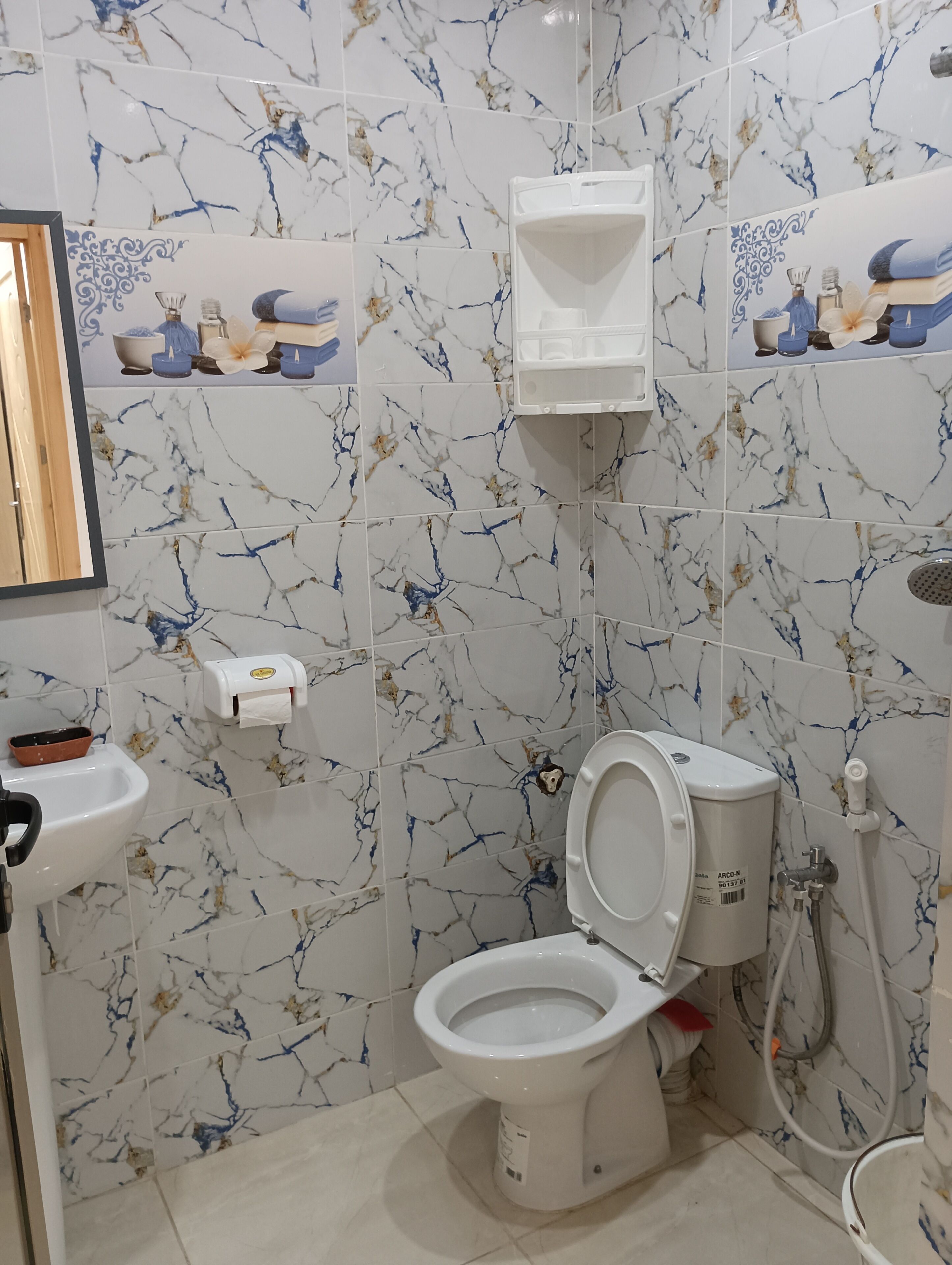 Handdukar, tvål och toalettpapper
