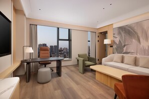 Deluxe suite, 1 kingsize bed | Woonruimte