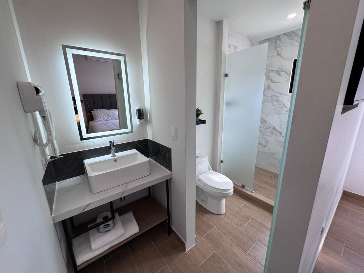 King Size bed with sofa | Bathroom | Shower, hair dryer, towels, soap