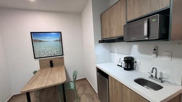 Superior King Size Bed with Work Area | Private kitchen
