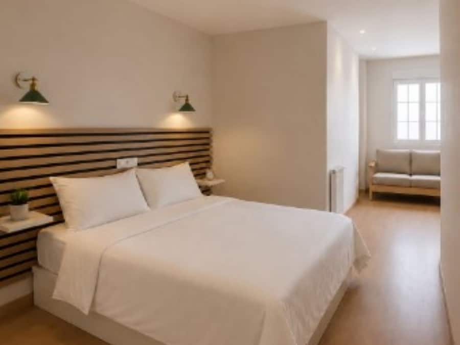 Escritorio, wifi gratis y ropa de cama