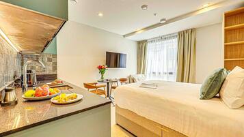 Desk, iron/ironing board, travel crib, free WiFi