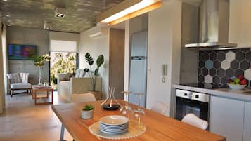 Deluxe Apartment, 2 Bedrooms, Garden View | Private kitchen | Microwave, oven, cookware/dishes/utensils