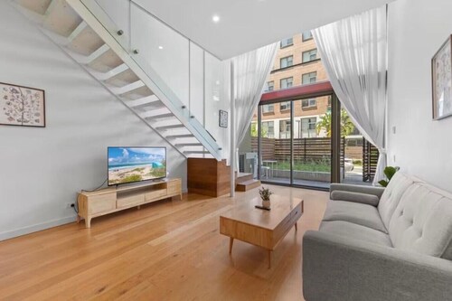 Elegant Loft Living w/ Soaring Ceilings