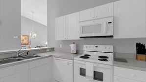 Coffee/tea maker, microwave, oven, stovetop - Comfortable 3BR Apt at Club Cortile Near Disney (Kissimmee)