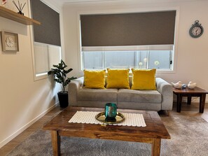 Living area - Relaxing & Modern Jervis Bay Retreat | Minutes to Beaches, Shops & Nature (Vincentia)