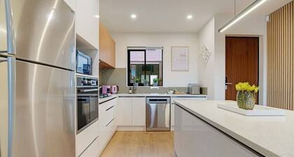 Spacious 4BR Family Haven with Air-con & Parking