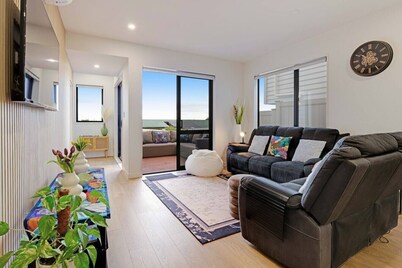 Spacious 4BR Family Haven with Air-con & Parking