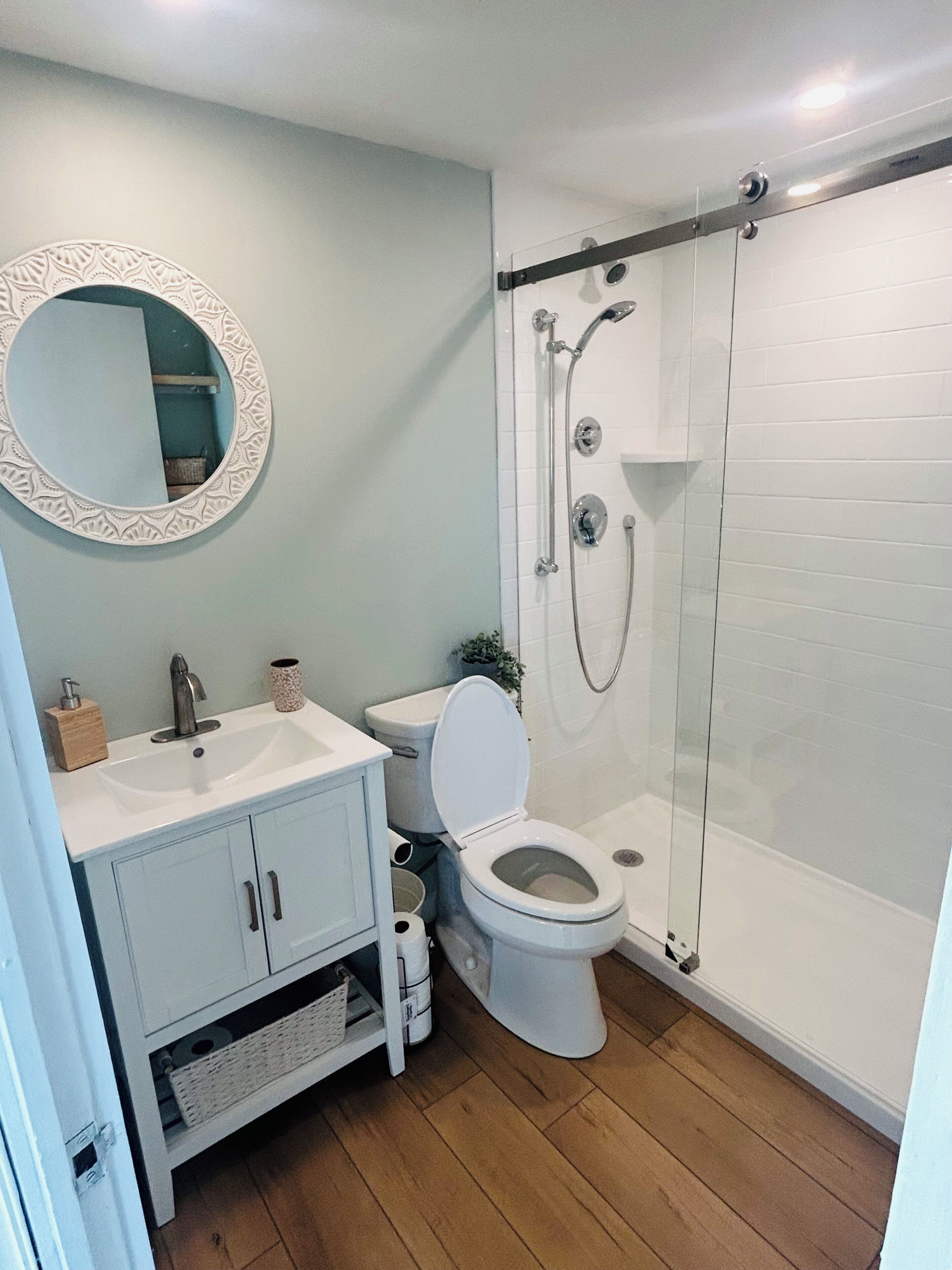 Shower, hair dryer, towels, soap