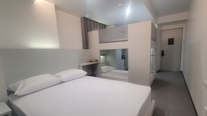 A hotel room with a bed, a desk, a wardrobe, and a mirror. - Stay Together in Seoul (Seoul)