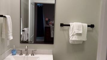 Shower, towels, toilet paper