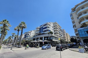 A hotel with a modern design, featuring balconies and a prominent entrance. - Casa Sul Mare, Vlore, Albania (Vlore)